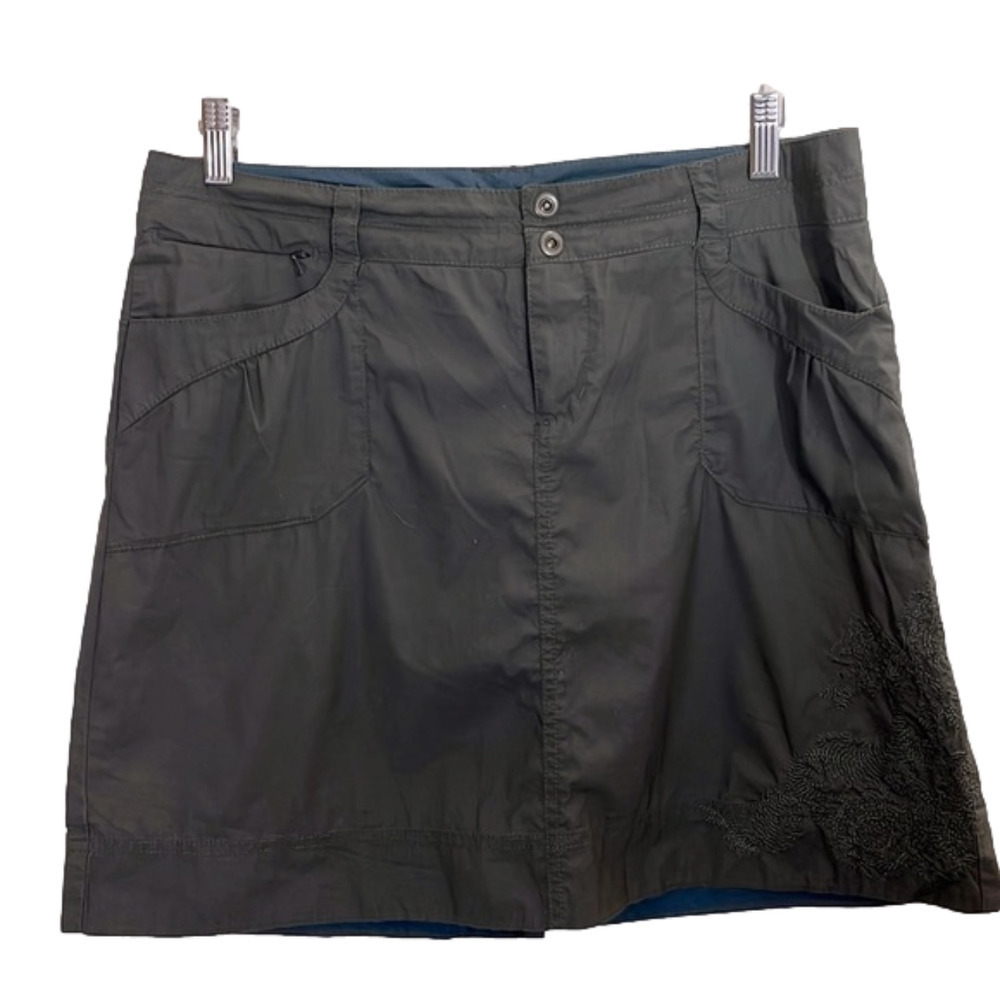 Rei hiking skirt, size 10, dark khaki green, in good, embroidered accent